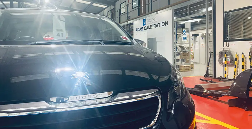 Peugeot approved repairer sign at Autocraft Telford